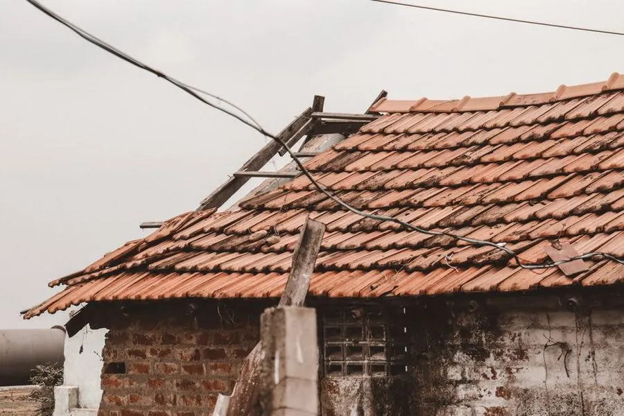 An old, worn roof being assessed for repair or replacement