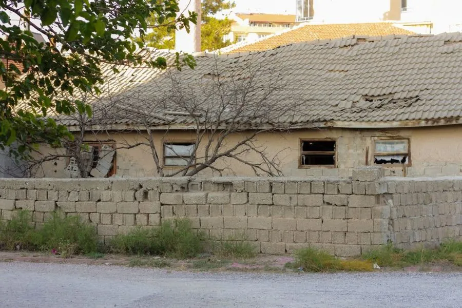 An older roof showing signs of sagging and disrepair