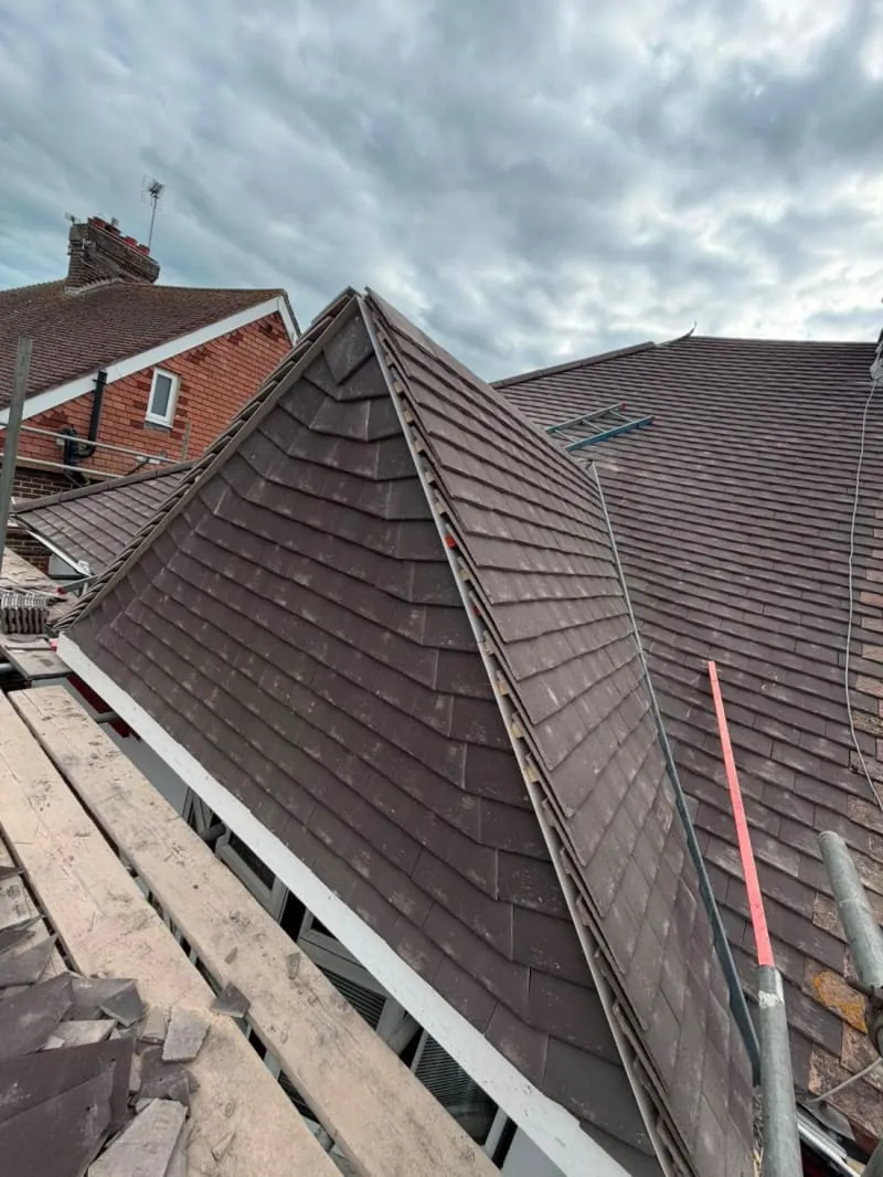 Newly finished tiled roof on a Sussex home by N Fullers